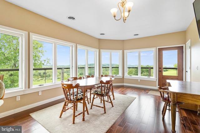9207 Douglas Rd, Olanta, PA 16863 - dining area with healthy amount of natural light, baseboards, and dark wood-type flooring