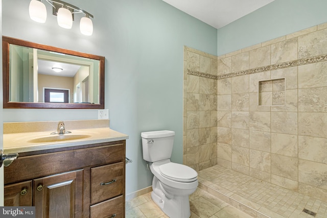 9207 Douglas Rd, Olanta, PA 16863 - full bath with toilet, vanity, tiled shower, and baseboards
