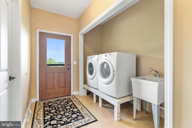 9207 Douglas Rd, Olanta, PA 16863 - washroom featuring separate washer and dryer and light tile patterned floors