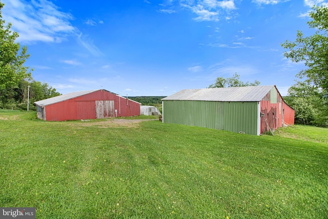 9207 Douglas Rd, Olanta, PA 16863 - view of grassy yard with a pole building and an outbuilding