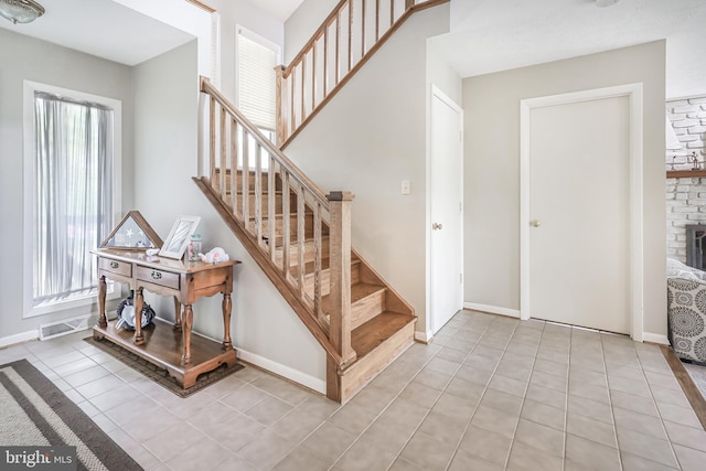 200 Sunset Cir, Cross Junction, VA 22625 - stairs featuring plenty of natural light, tile patterned floors, and baseboards