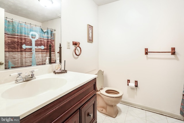200 Sunset Cir, Cross Junction, VA 22625 - bathroom featuring vanity, toilet, and baseboards