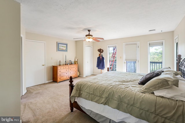 200 Sunset Cir, Cross Junction, VA 22625 - bedroom featuring light colored carpet, baseboards, ceiling fan, and access to exterior