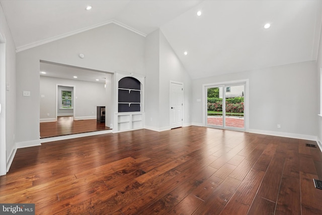 unfurnished living room featuring high vaulted ceiling, hardwood / wood-style flooring, built in features, baseboards, and a fireplace