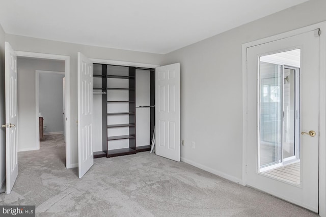 6510 Lake Park Dr Unit 2E/201, Greenbelt, MD 20770 - unfurnished bedroom featuring carpet, baseboards, and a closet