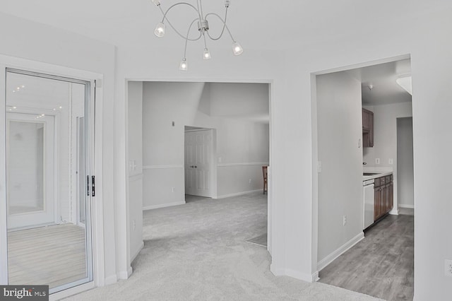 6510 Lake Park Dr Unit 2E/201, Greenbelt, MD 20770 - corridor with baseboards and a chandelier