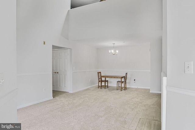 6510 Lake Park Dr Unit 2E/201, Greenbelt, MD 20770 - carpeted spare room featuring a chandelier and baseboards