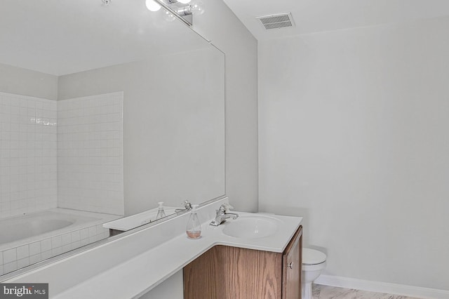6510 Lake Park Dr Unit 2E/201, Greenbelt, MD 20770 - bathroom with toilet, vanity, and baseboards