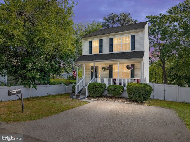 7737 Overhill Rd, Glen Burnie, MD 21060 - view of front of house featuring a gate, covered porch, and a shingled roof
