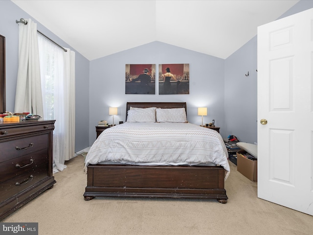 7737 Overhill Rd, Glen Burnie, MD 21060 - bedroom with light carpet and lofted ceiling