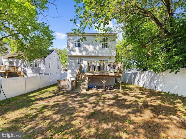 7737 Overhill Rd, Glen Burnie, MD 21060 - rear view of property with a deck, a fenced backyard, and stairs