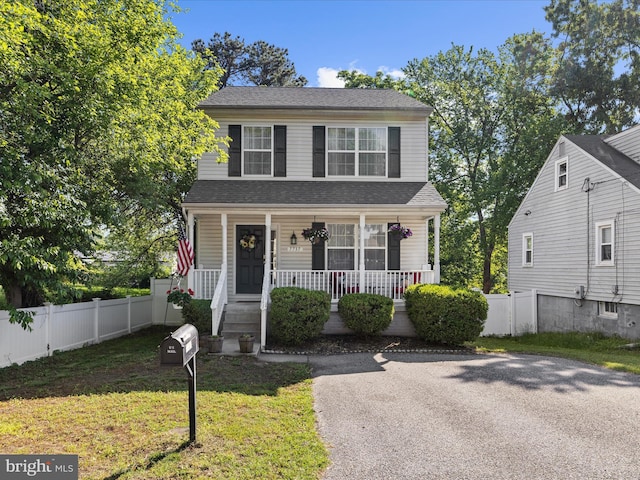7737 Overhill Rd, Glen Burnie, MD 21060 - view of front of house with a porch and roof with shingles