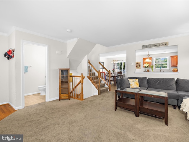 7737 Overhill Rd, Glen Burnie, MD 21060 - living area featuring a chandelier, ornamental molding, and light carpet