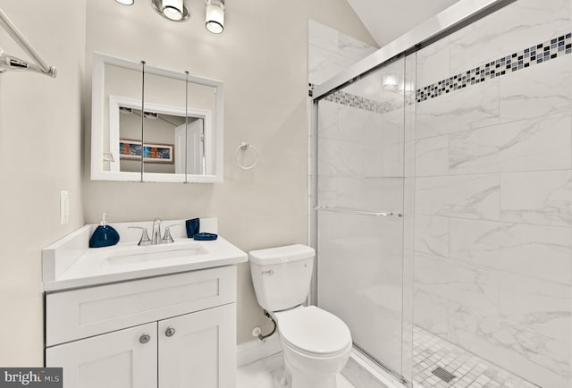 4521 Clay St NE, Washington, DC 20019 - bathroom featuring marble look tile flooring, vanity, toilet, a shower stall, and lofted ceiling