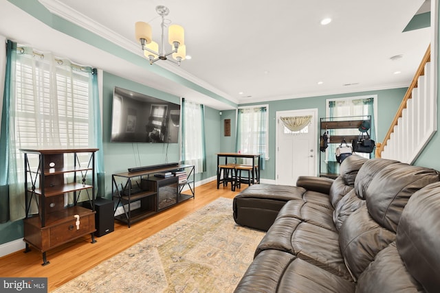 4521 Clay St NE, Washington, DC 20019 - living area with crown molding, a chandelier, wood finished floors, stairs, and recessed lighting