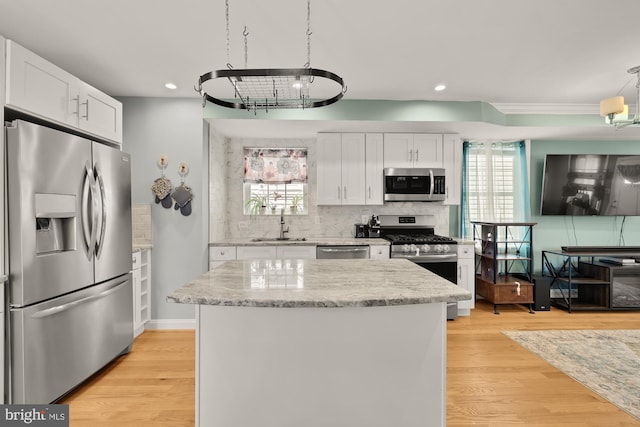 4521 Clay St NE, Washington, DC 20019 - kitchen with appliances with stainless steel finishes, a chandelier, a sink, backsplash, and recessed lighting