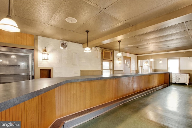 166 Tulpehocken St, Bernville, PA 19506 - kitchen featuring a drop ceiling, dark countertops, hanging light fixtures, and tile patterned floors