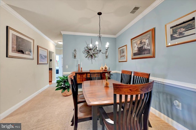 1050 Crest Way Unit 403, York, PA 17403 - dining space featuring a chandelier, light carpet, crown molding, and baseboards