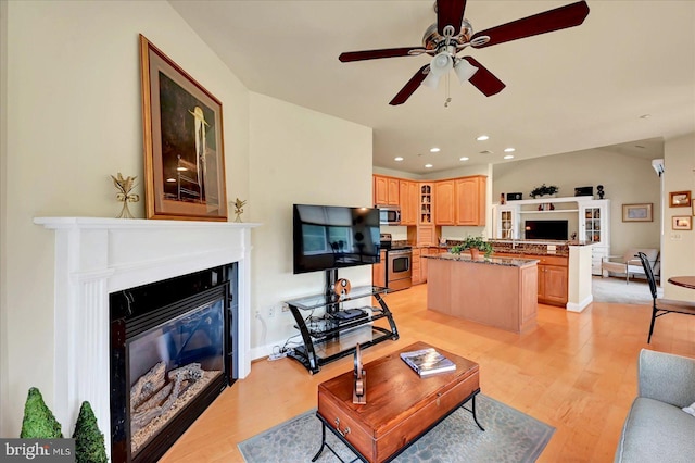 1050 Crest Way Unit 403, York, PA 17403 - living area featuring a glass covered fireplace, ceiling fan, light wood-style floors, recessed lighting, and baseboards