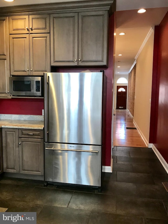 2205 E Baltimore St, Baltimore, MD 21231 - kitchen with stainless steel appliances, ornamental molding, baseboards, and recessed lighting
