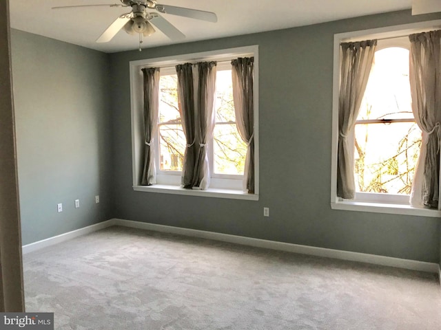 2205 E Baltimore St, Baltimore, MD 21231 - carpeted empty room with baseboards and a ceiling fan