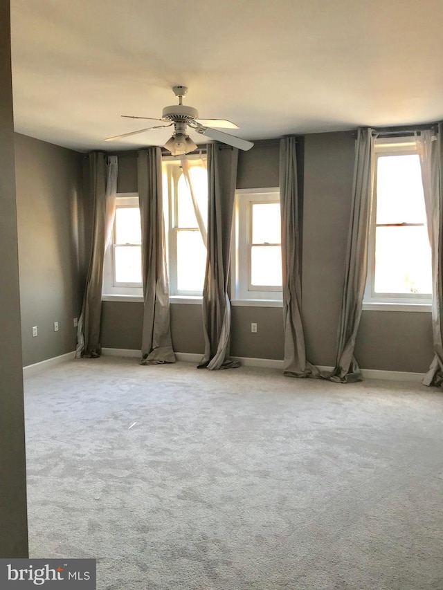 2205 E Baltimore St, Baltimore, MD 21231 - carpeted spare room featuring ceiling fan and baseboards
