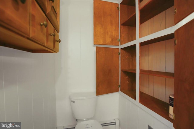 38 Mountain Rd, Orrtanna, PA 17353 - half bathroom with toilet and a baseboard heating unit