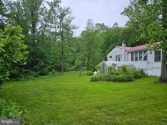 38 Mountain Rd, Orrtanna, PA 17353 - view of green lawn featuring a view of trees