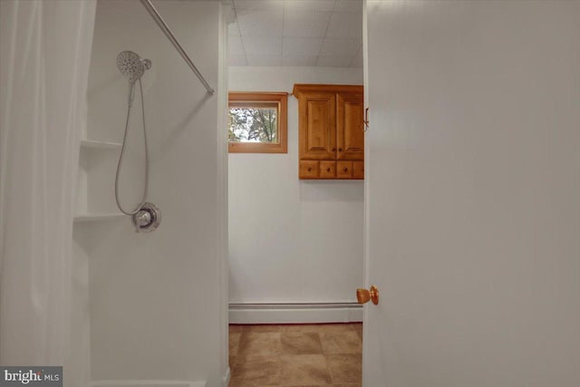 38 Mountain Rd, Orrtanna, PA 17353 - bathroom featuring a baseboard radiator, a shower, and baseboards