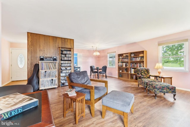 4105 Majestic Ln, Fairfax, VA 22033 - living area featuring wood finished floors, baseboards, and a chandelier