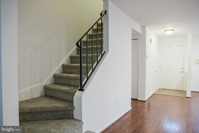 7619 S Arbory Ln Unit 339, Laurel, MD 20707 - stairs featuring wood finished floors and baseboards