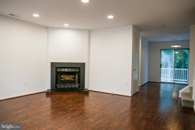 7619 S Arbory Ln Unit 339, Laurel, MD 20707 - unfurnished living room with wood finished floors, recessed lighting, and a fireplace with raised hearth