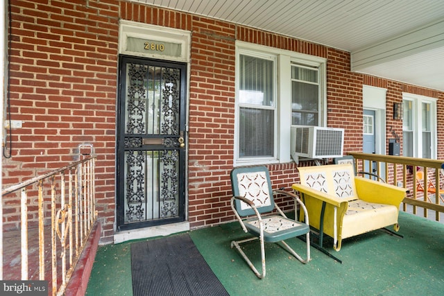 2810 Ellicott Dr, Baltimore, MD 21216 - view of exterior entry with covered porch and brick siding