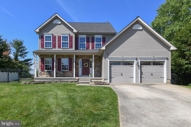 12 Ethan Ter, Woolwich Twp, NJ 08085 - view of front of house featuring an attached garage, concrete driveway, a porch, and stone siding