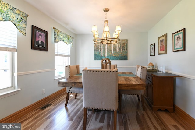 12 Ethan Ter, Woolwich Twp, NJ 08085 - dining space featuring a chandelier, wood finished floors, and baseboards