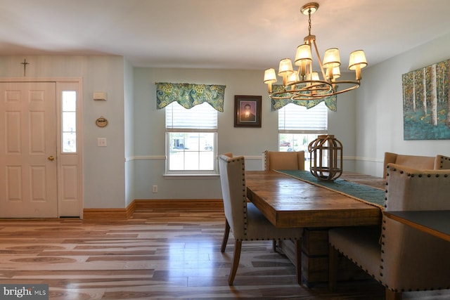 12 Ethan Ter, Woolwich Twp, NJ 08085 - dining room with a chandelier, wood finished floors, and baseboards