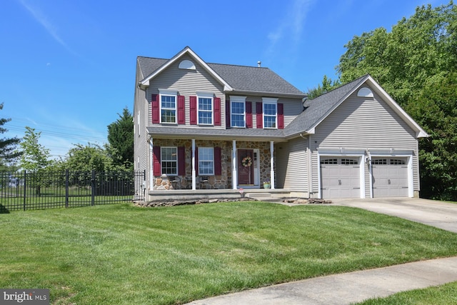 12 Ethan Ter, Woolwich Twp, NJ 08085 - traditional home with covered porch, driveway, a garage, stone siding, and roof with shingles