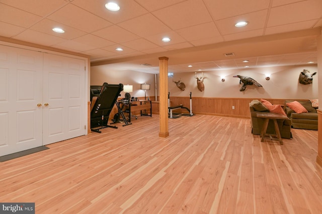 12 Ethan Ter, Woolwich Twp, NJ 08085 - workout area with wainscoting, wood finished floors, a drop ceiling, and wooden walls