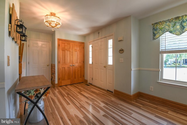 12 Ethan Ter, Woolwich Twp, NJ 08085 - entryway featuring light wood finished floors, a chandelier, and baseboards