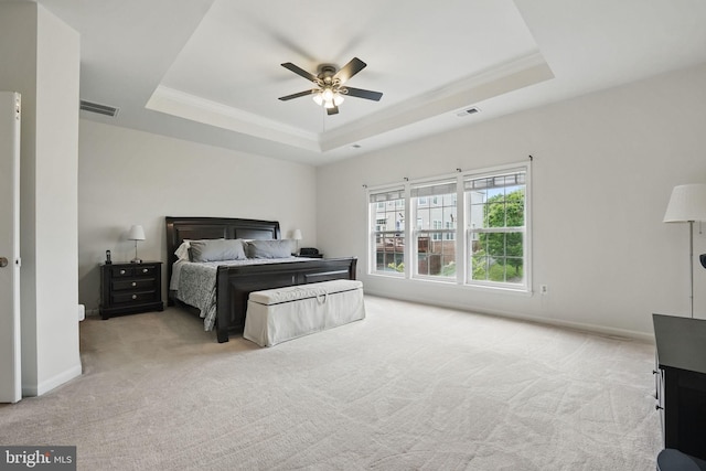 8313 Middle Ruddings Dr, Lorton, VA 22079 - carpeted bedroom featuring a raised ceiling, ornamental molding, baseboards, and ceiling fan