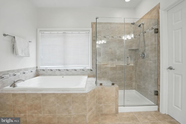 8313 Middle Ruddings Dr, Lorton, VA 22079 - full bathroom featuring a bath, a shower stall, and tile patterned floors