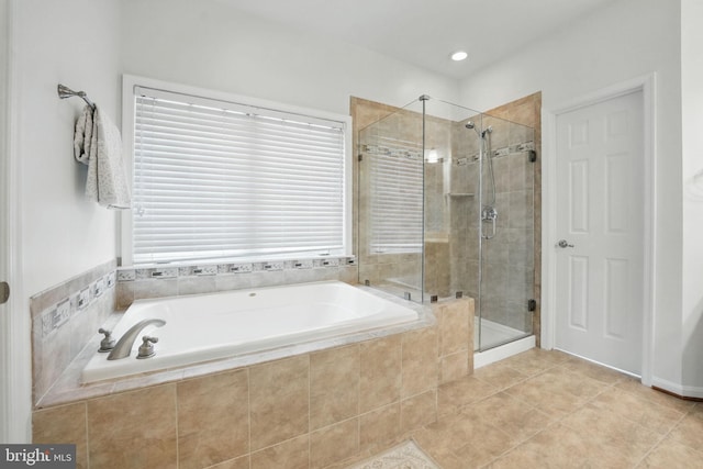8313 Middle Ruddings Dr, Lorton, VA 22079 - full bath with a bath, a shower stall, and tile patterned flooring