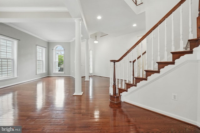 8313 Middle Ruddings Dr, Lorton, VA 22079 - entryway featuring hardwood / wood-style flooring, decorative columns, ornamental molding, baseboards, and recessed lighting