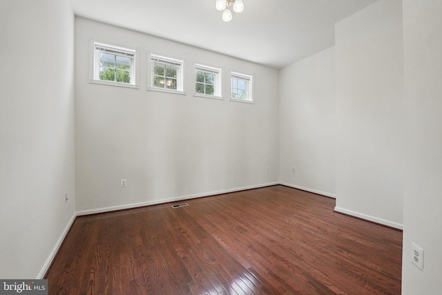 8313 Middle Ruddings Dr, Lorton, VA 22079 - spare room featuring wood-type flooring and baseboards