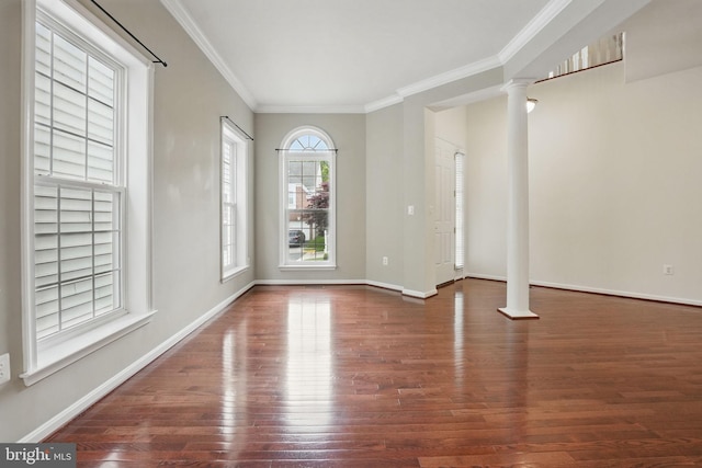 8313 Middle Ruddings Dr, Lorton, VA 22079 - empty room with decorative columns, wood finished floors, ornamental molding, and baseboards