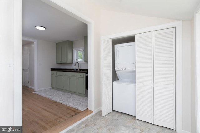 511 Goldsborough Ave, Cambridge, MD 21613 - washroom featuring stacked washing machine and dryer and baseboards