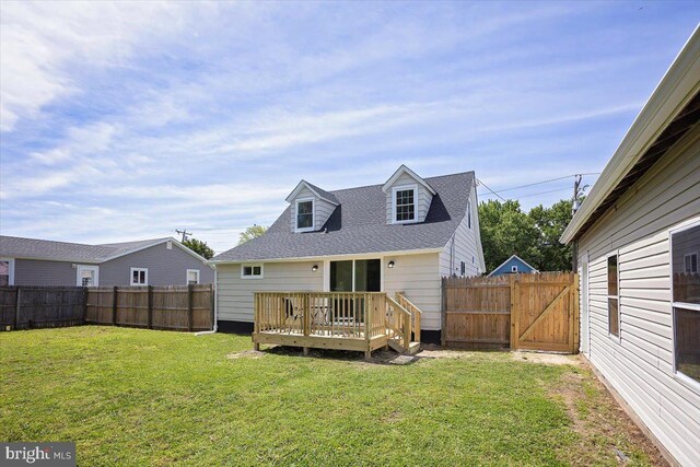 511 Goldsborough Ave, Cambridge, MD 21613 - rear view of house featuring a wooden deck, a shingled roof, and a gate