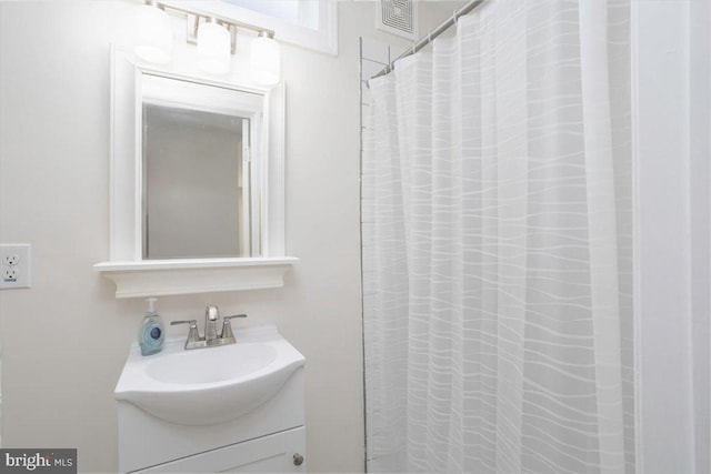 511 Goldsborough Ave, Cambridge, MD 21613 - full bathroom featuring vanity and a shower with curtain