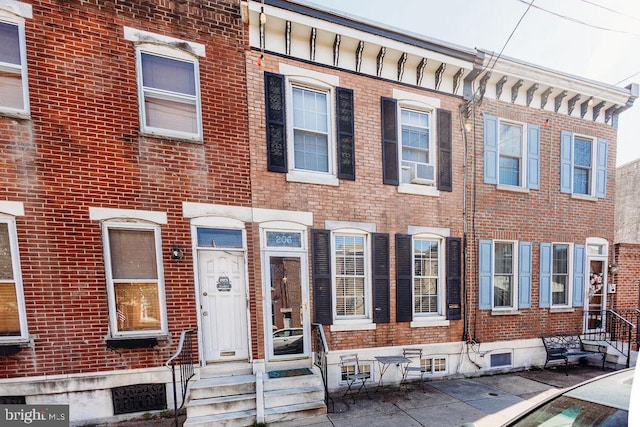 206 Mifflin St, Philadelphia, PA 19148 - view of property featuring brick siding and entry steps