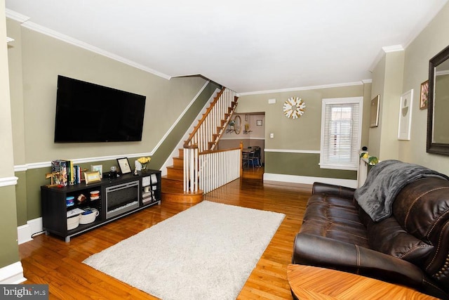 206 Mifflin St, Philadelphia, PA 19148 - living room featuring stairway, wood finished floors, ornamental molding, and baseboards